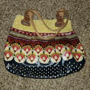 Fossil coated canvas tribal bag